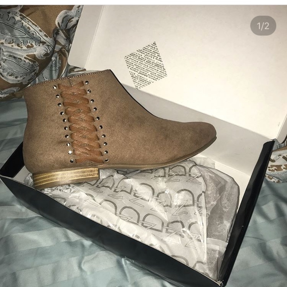 NEW. New direction booties size 6.5
